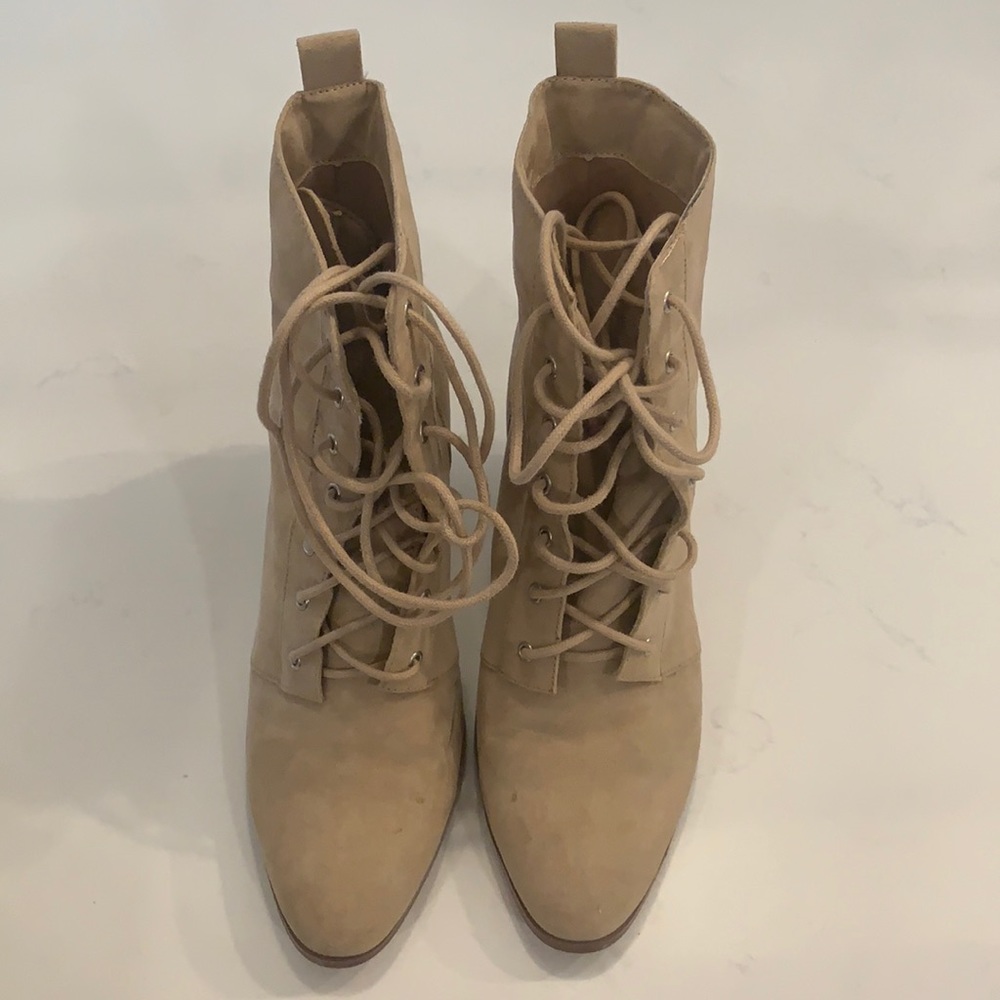 Beige boots, tie up the front